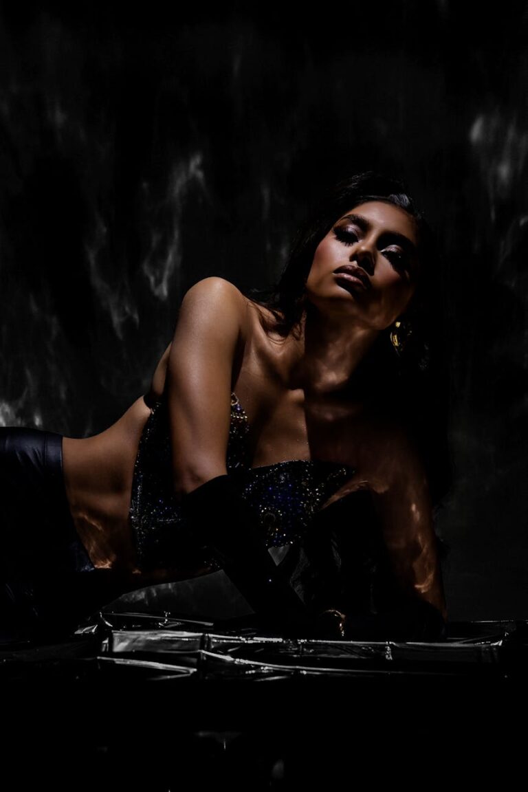 dramatic portrait of stylish woman in dark setting