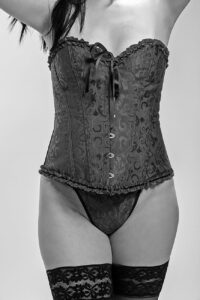 woman wearing lace corset